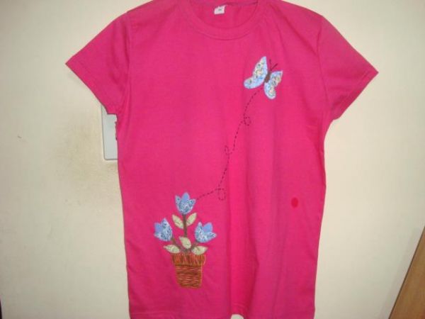 Camiseta borboleta rosa